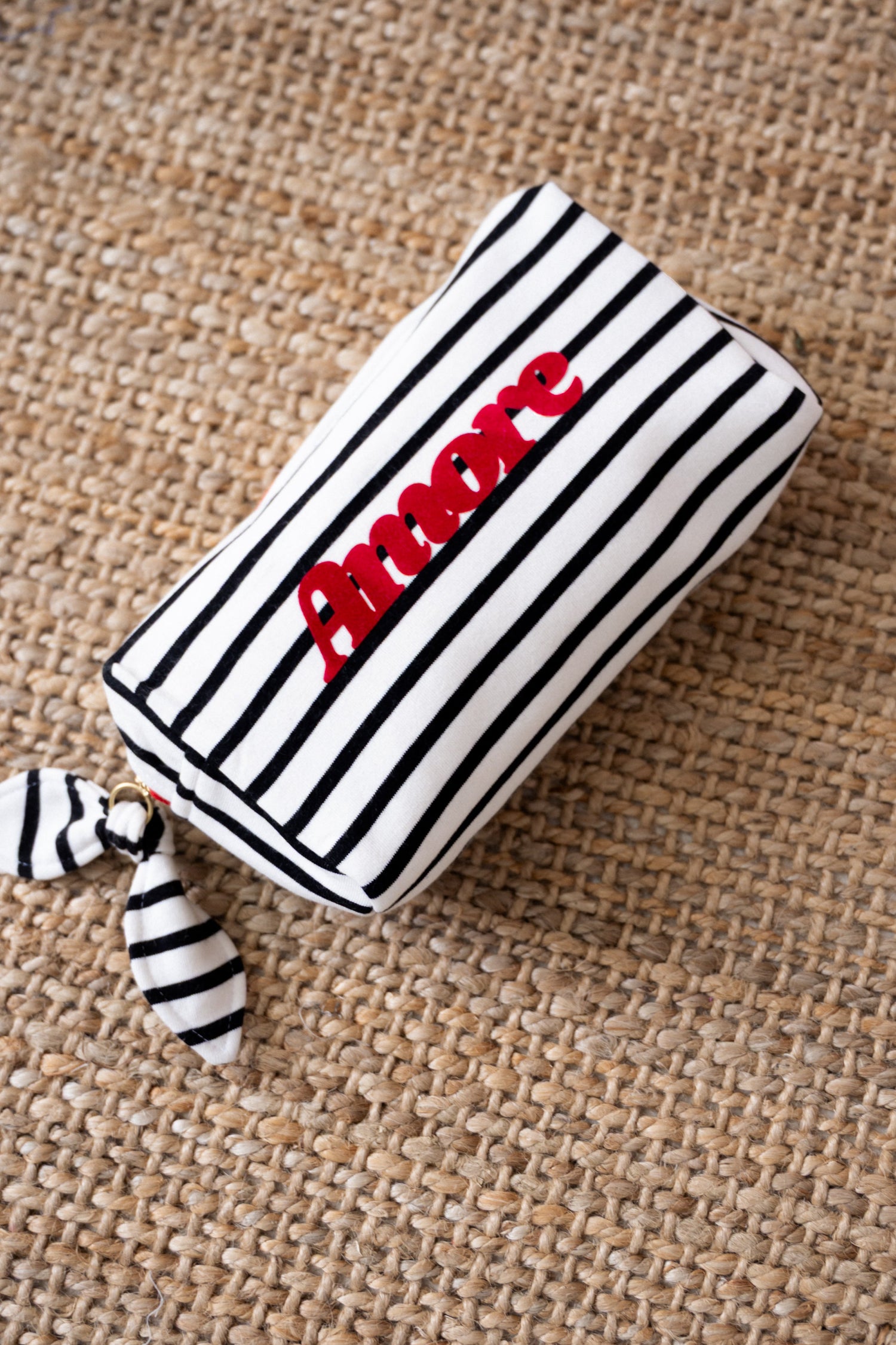 COSMETIC BAG AMORE STRIPED